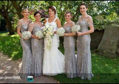 bride with bridesmaids hirst priory wedding